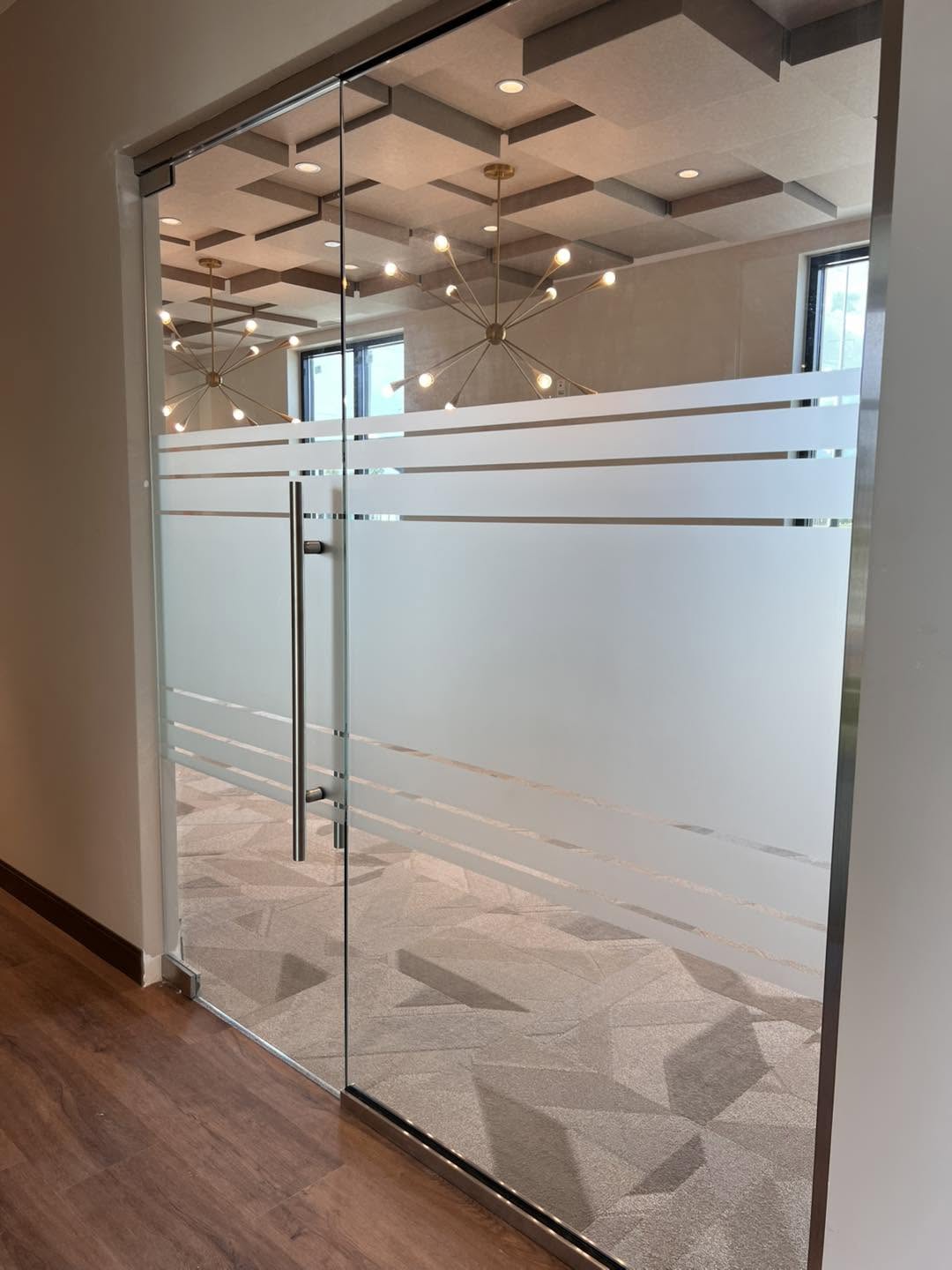 First Tee Naples office glass with privacy film and clear stripes